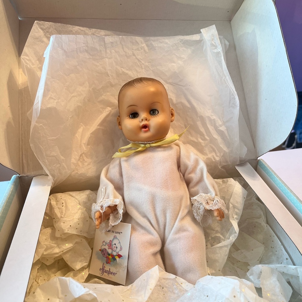 Adorable Baby Doll with Yellow Accents